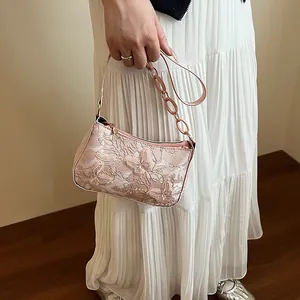 Pink underarm bag with butterfly appliques and jacquard lace texture for women