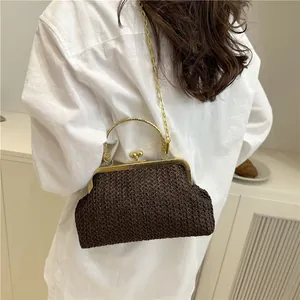 Brown woven chain shell bag with retro kiss lock and floral engraved handle for women