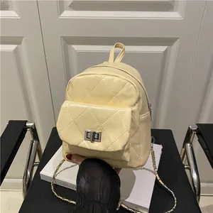 Quilted mini backpack for women featuring cream PU leather and elegant chain straps