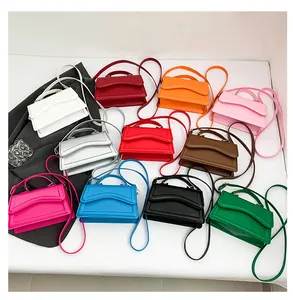 Detailed array of stylish small crossbody square bags in eleven vibrant candy colors