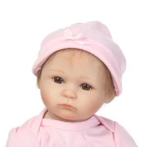 Poupée bébé reborn réaliste avec tenue rose en coton et bonnet à nœud assorti