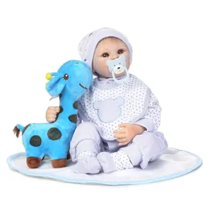 Lifelike reborn baby doll with blue outfit, giraffe plush toy and bear pacifier set