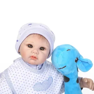 Realistic reborn baby doll in blue striped outfit with a plush giraffe toy
