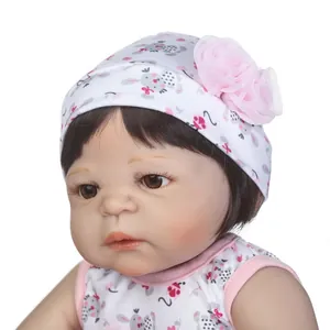 Lifelike soft vinyl reborn baby doll girl in bunny print outfit and floral cap