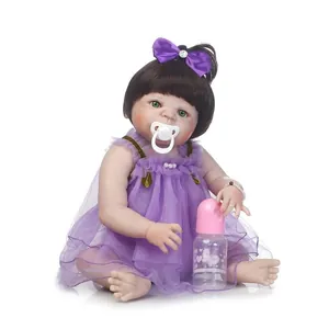 Poupée réaliste Reborn en robe de dentelle violette avec tétine et biberon de lait