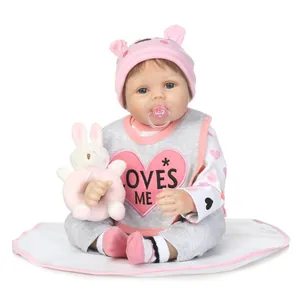 Lifelike 55cm reborn baby doll set with pink outfit, pacifier and rabbit plush toy