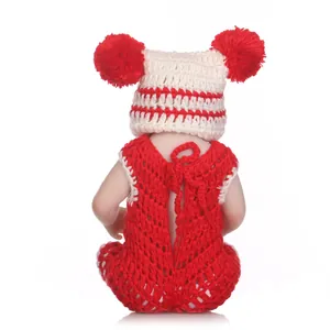 Handmade red and white knitted newborn baby photography outfit with cute pompom hat