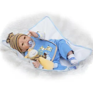 Lifelike reborn baby doll with blue animal print outfit, giraffe toy and pacifier
