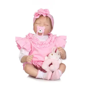 Poupée Reborn Réaliste en Silicone Souple Comme Un Nouveau Né Fille Avec Tenue Rose à Fleurs et Peluche