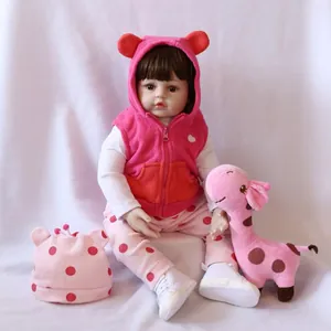 60cm lifelike reborn baby doll in pink fleece vest and polka dot outfit with giraffe toy