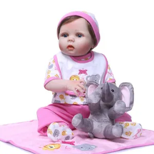 Lifelike reborn baby doll in pink animal outfit with blue eyes and elephant plush toy