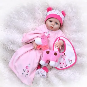Realistic reborn baby doll set with pink fleece outfit, giraffe plush and flower embroidery
