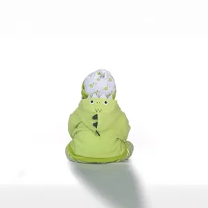 Green fleece baby dinosaur hoodie and hat set with 3D fins on white background