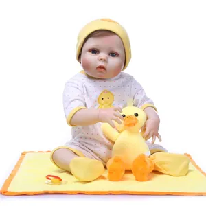Lifelike baby doll set featuring yellow chick outfit, plush duck, pacifier and floor mat