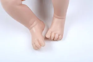 Realistic reborn doll kit leg parts with detailed skin texture and life-like toes