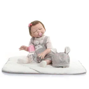 Lifelike reborn baby doll set with pink floral clip and cute bunny overalls