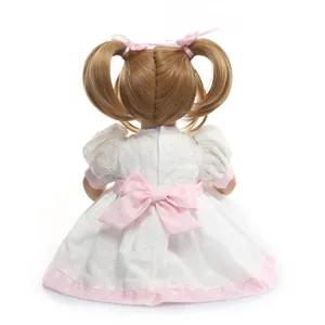 NPK lifelike silicone reborn doll with blonde pigtails in a pink bow white lace dress