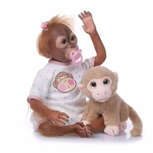 Realistische Reborn Affe Puppe Silikon Weiches Lebensechtes Menschenaffe Baby Spielzeug Mit Rosa Blumen Kleidung Schnuller