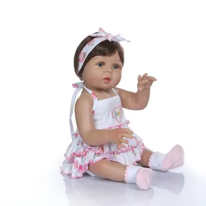 Poupée bébé réaliste 48cm en silicone souple aux yeux bleus et robe à fleurs