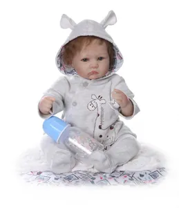 Detail of lifelike baby doll in grey giraffe outfit with pacifier and bottle