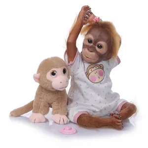 Realistische Reborn Orang-Utan Puppe im Blumenoutfit mit Plüschaffe und Schnuller für Kinder