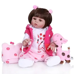 48cm reborn baby doll set with pink giraffe outfit and plush toy on white background