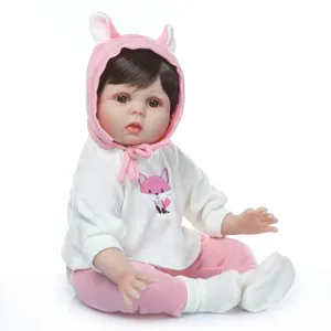 Lifelike soft silicone baby doll with fox embroidery sweater and pink rabbit hat