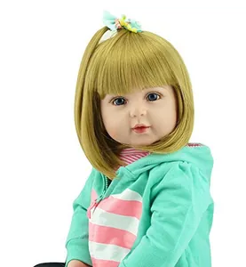 Close-up of a 60cm reborn baby doll featuring blonde hair and a mint green hoodie set