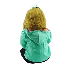 Detail of 60cm lifelike baby doll back view with long blonde hair and mint green hoodie