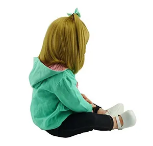 Rear view of 60cm realistic baby doll featuring long blonde hair and mint green hoodie