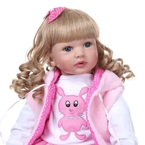 Lifelike reborn toddler princess doll with blonde curly hair and pink plush vest
