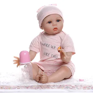 Poupée bébé reborn réaliste de 55cm en barboteuse rose avec biberon et sucette