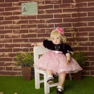 60cm realistic reborn toddler doll with long golden hair and pink sequin tulle dress