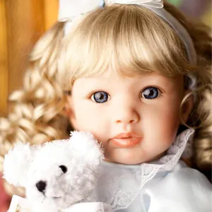 60cm realistic reborn toddler baby doll with blue eyes, blonde hair and white plush bear