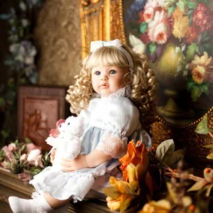 Realistic Reborn Toddler Baby Doll With Golden Curly Hair Light Blue Lace Satin Dress Soft Silicone Cloth Body Toy Doll