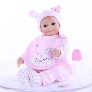 Poupée bébé reborn réaliste avec tenue de lapin rose, biberon et accessoire de tétine