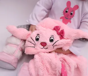 Detailed view of pink plush rabbit reborn baby outfit with soft embroidery and bow