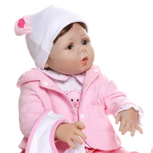 55cm lifelike reborn baby doll in pink fleece coat and white knit hat with bow