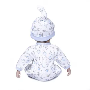 Rear view of 30cm reborn baby doll wearing a patterned blue and white romper suit