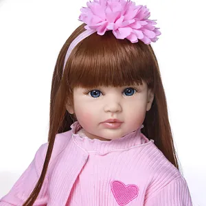60cm realistic reborn toddler doll with brown hair, blue eyes and pink heart outfit