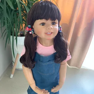 98cm realistic girl doll with curly pigtails wearing pink shirt and denim pinafore dress
