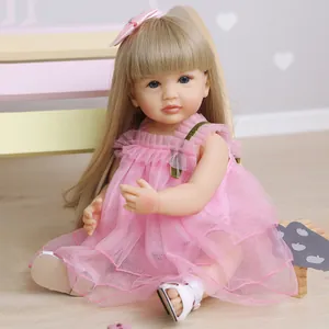 Poupée Reborn fille en robe de tulle rose avec yeux bleus et longs cheveux blonds