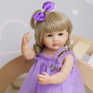 55cm waterproof soft silicone baby doll with blonde hair and purple mesh dress