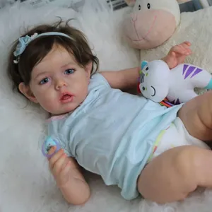 22-inch lifelike reborn doll kit Liam with blue eyes and matching headband on soft rug