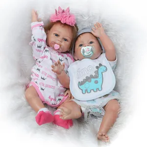 Lifelike 48cm full body silicone reborn dolls in pink princess and blue dinosaur outfits