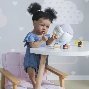 Poupée réaliste bébé fille afro-américaine avec cheveux bouclés en barboteuse