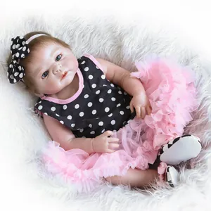 Lifelike 48cm full body silicone reborn doll in polka dot vest and pink tutu skirt
