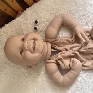 Lifelike 22-inch smiling reborn doll kit with realistic silicone limbs and accessories