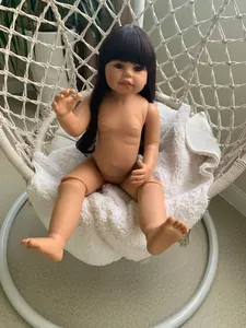 Macro detail of 70cm ball-jointed baby doll with realistic skin and brown long hair