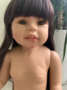 Close-up of 70cm realistic toddler doll featuring dark brown hair and detailed facial skin
